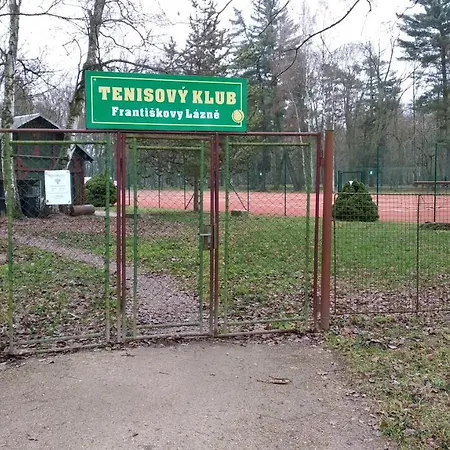 Apartmán v dřevěném domě *