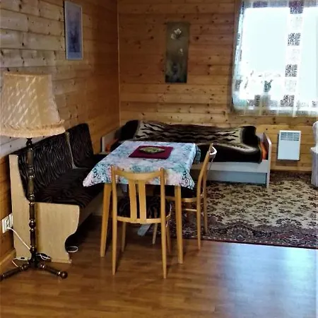 Apartmán v dřevěném domě